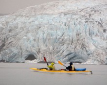 Sea kayaking by glacier